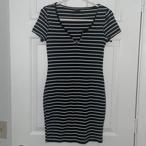 Body con black and white striped dress